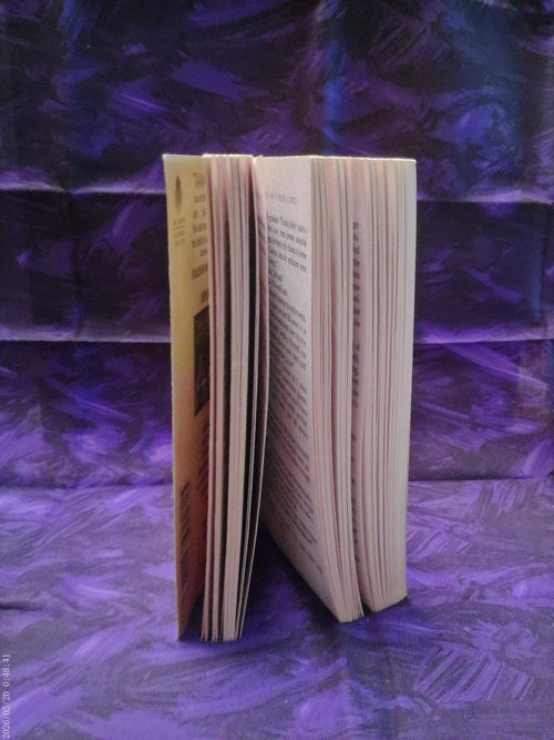 Death of a Rug Lord by Tamar Myers — page edges